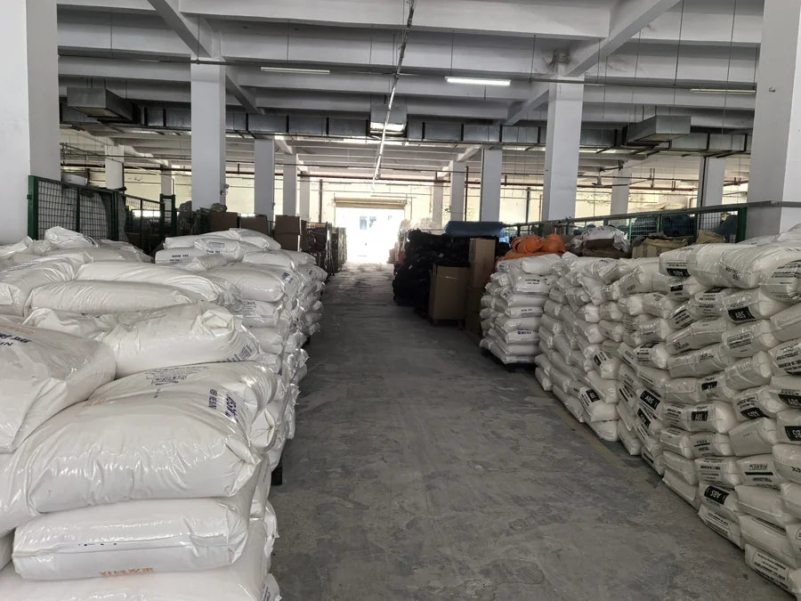 Raw-material storage in the supplied factory photographs